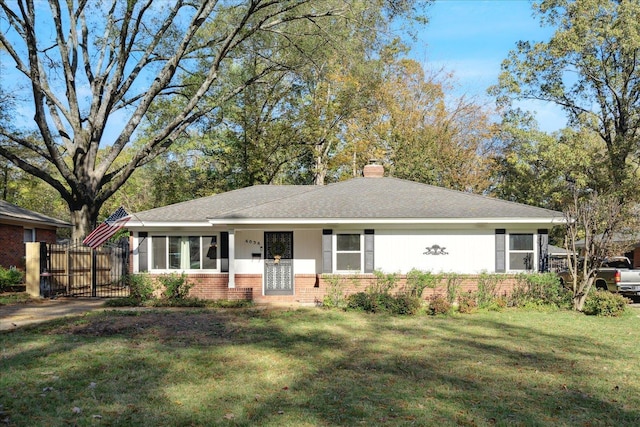 single story home with a front yard