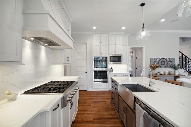 kitchen with backsplash, custom range hood, dark wood-type flooring, sink, and white cabinetry