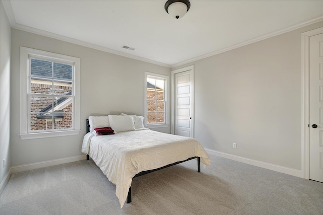 bedroom featuring light carpet and ornamental molding