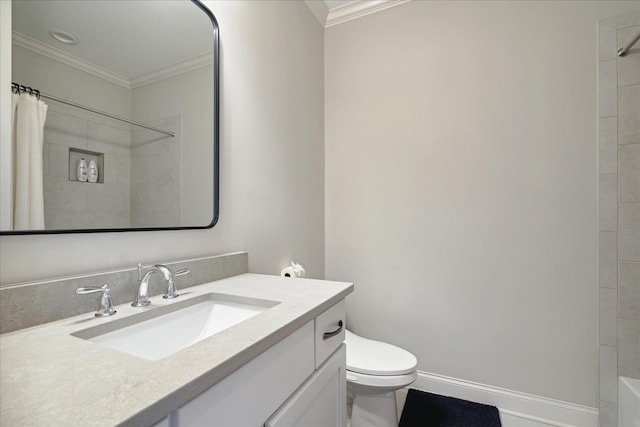 bathroom featuring vanity, ornamental molding, and toilet