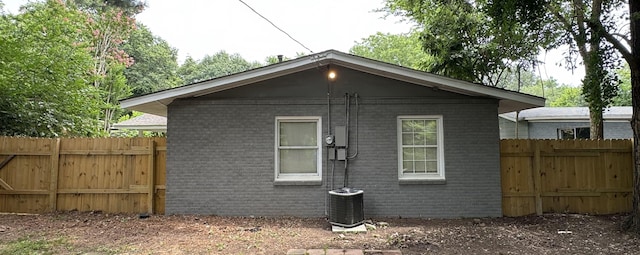 view of side of property featuring cooling unit