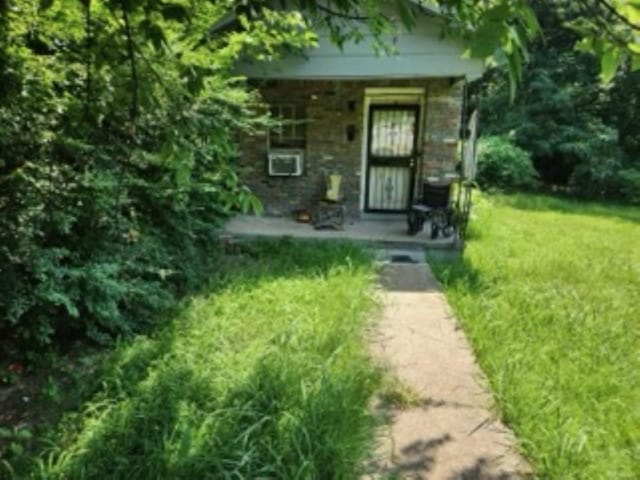 exterior space with a lawn