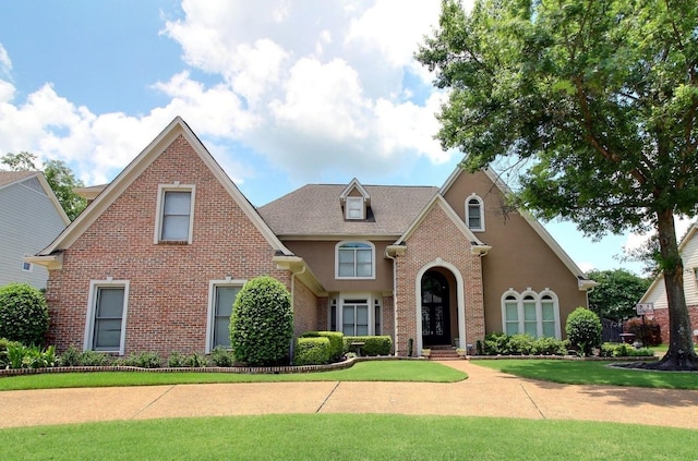 595 Kenrose St, Collierville, TN 38017 - traditional-style house featuring brick siding and a front yard