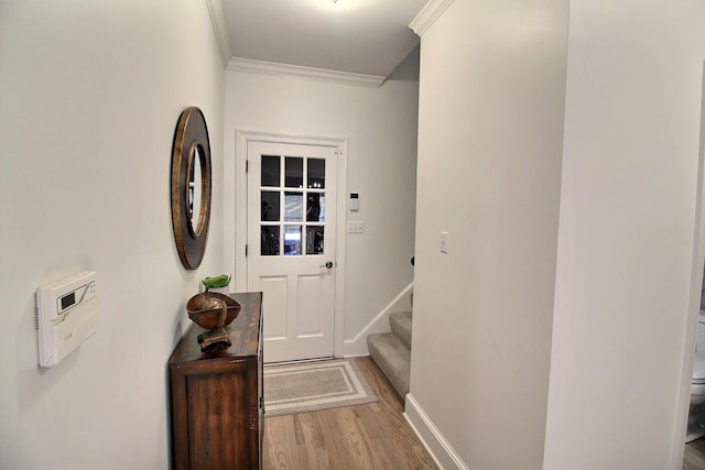 595 Kenrose St, Collierville, TN 38017 - doorway with crown molding, wood finished floors, and stairs