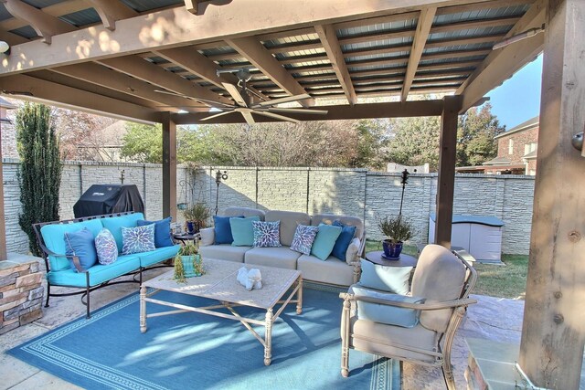 view of patio / terrace featuring an outdoor living space and a grill