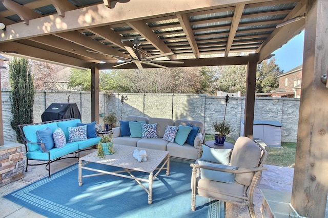 595 Kenrose St, Collierville, TN 38017 - fenced backyard featuring area for grilling, an outdoor living space, and a patio