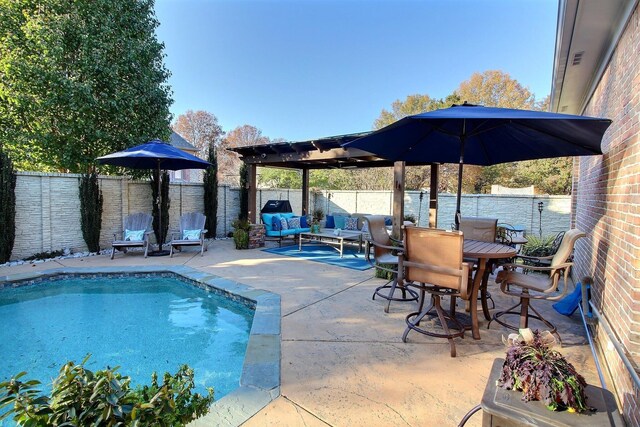 view of swimming pool featuring a patio area and an outdoor hangout area