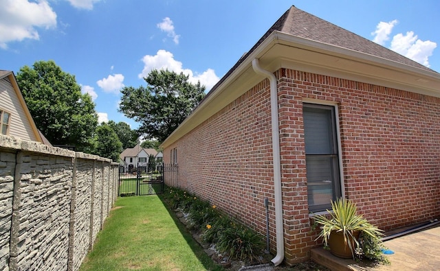 595 Kenrose St, Collierville, TN 38017 - view of home's exterior with brick siding and a shingled roof