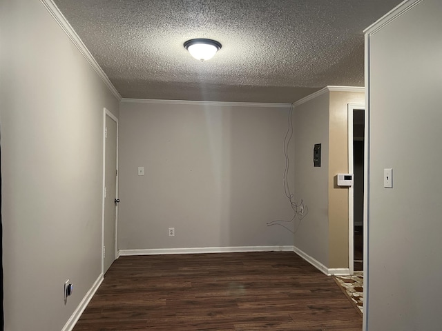 hall featuring dark hardwood / wood-style floors, crown molding, and a textured ceiling