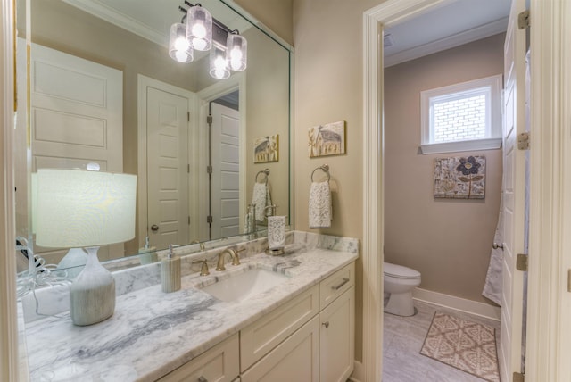 bathroom featuring tile patterned flooring, toilet, vanity, and ornamental molding