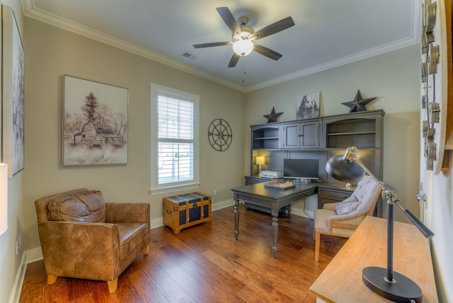 home office with hardwood / wood-style floors, ceiling fan, and ornamental molding