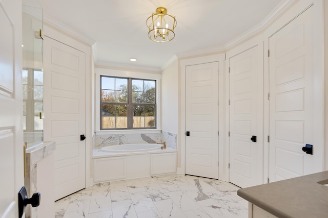 bathroom with a chandelier, a bath, and ornamental molding