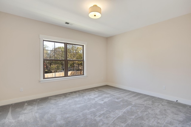 unfurnished room with carpet