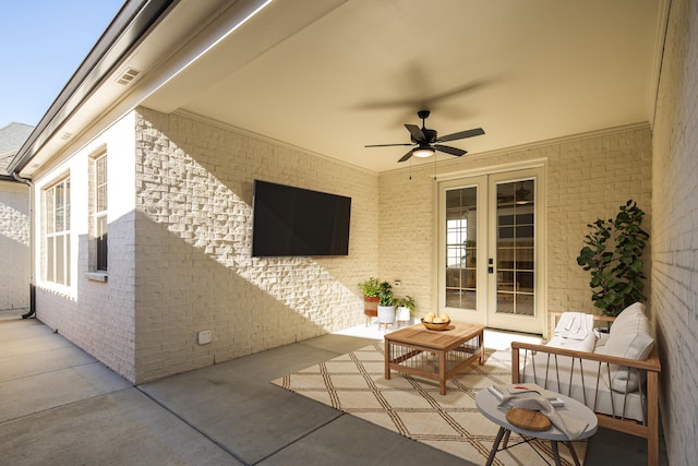 view of patio / terrace featuring ceiling fan, an outdoor hangout area, and french doors