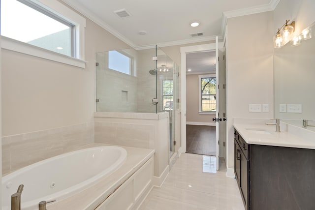 bathroom with tile patterned floors, vanity, independent shower and bath, and ornamental molding