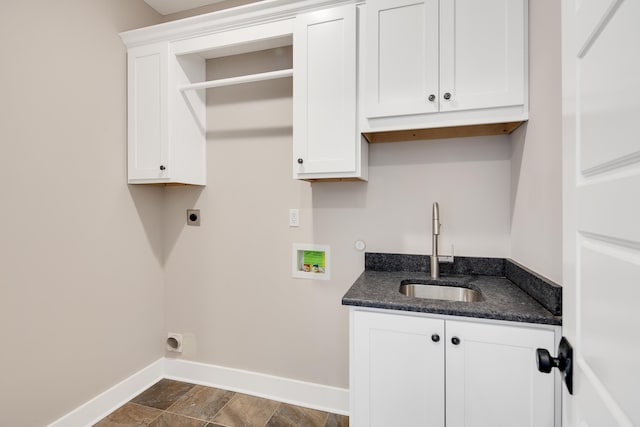 laundry area featuring electric dryer hookup, cabinets, sink, and hookup for a washing machine