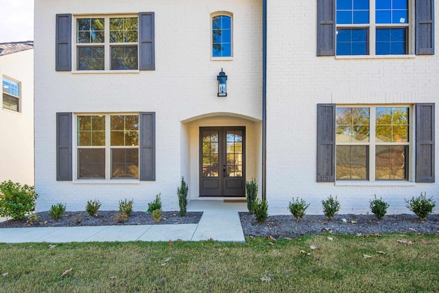 doorway to property featuring french doors