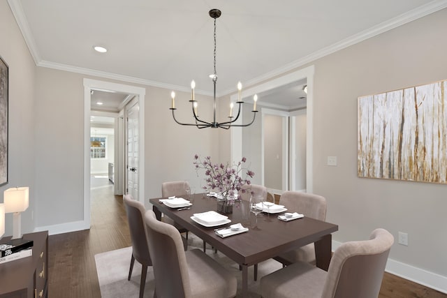 dining area with crown molding, dark hardwood / wood-style flooring, and an inviting chandelier