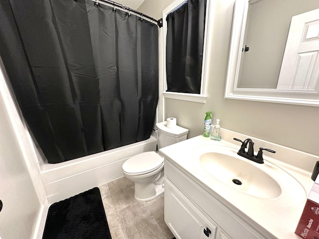 full bathroom featuring vanity, shower / bath combo, and toilet