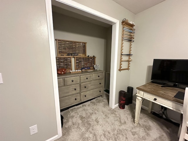 office area featuring light colored carpet