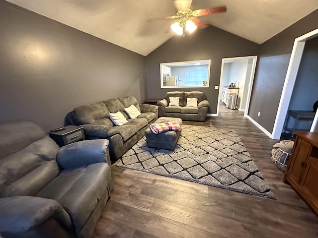 living room with vaulted ceiling, ceiling fan, and dark hardwood / wood-style floors