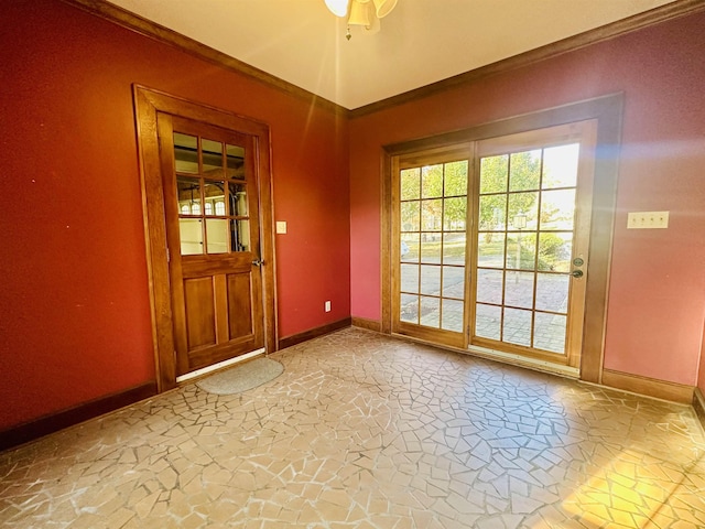 doorway to outside featuring ceiling fan and crown molding