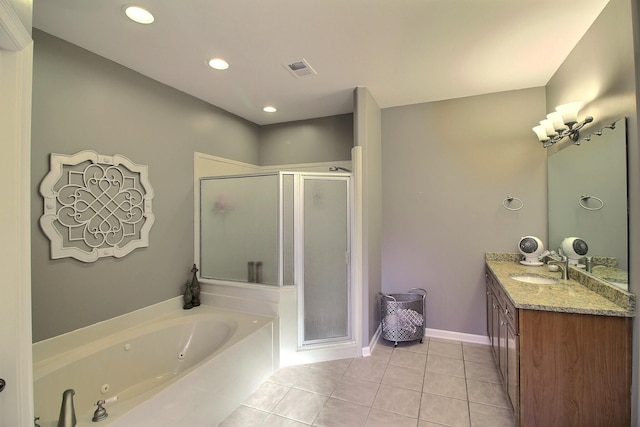 bathroom featuring vanity, tile patterned floors, and separate shower and tub