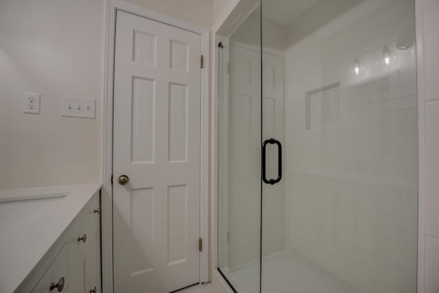 bathroom featuring walk in shower