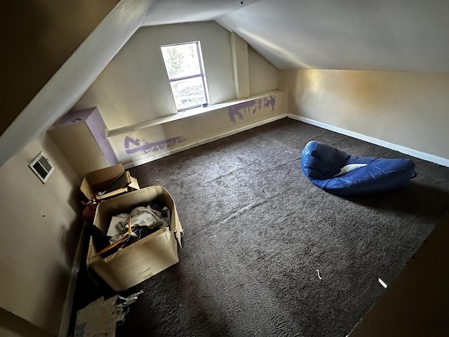 bonus room with carpet and lofted ceiling