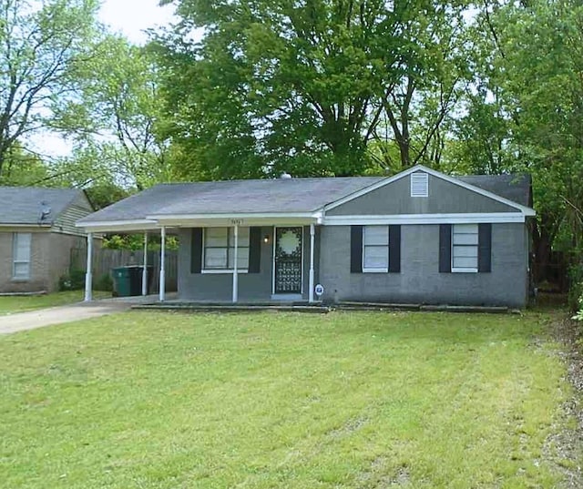 view of front facade with a porch and a front lawn