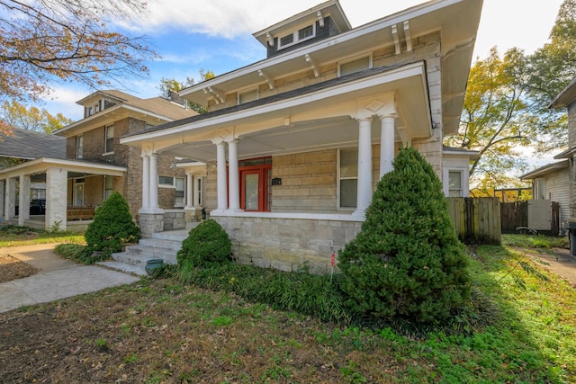 italianate-style house with covered porch