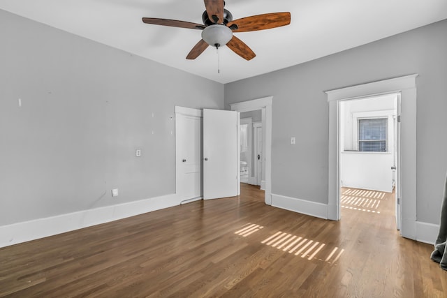 unfurnished bedroom with hardwood / wood-style floors and ceiling fan