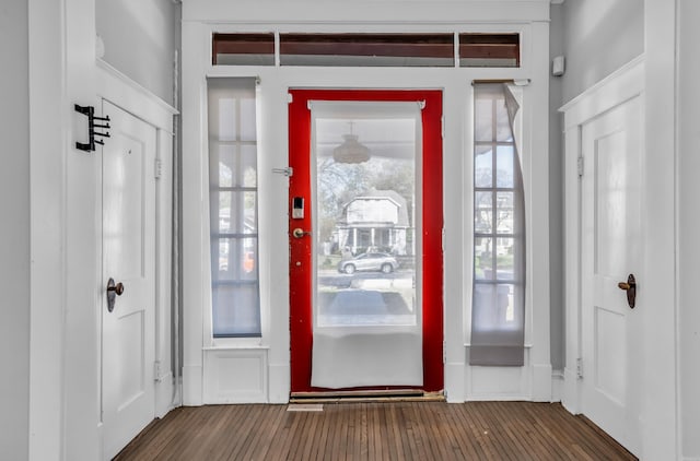 foyer entrance with dark hardwood / wood-style flooring