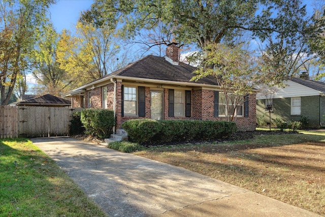 ranch-style home with a front yard