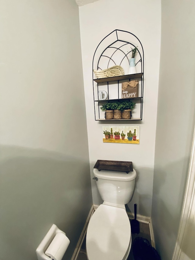 bathroom featuring toilet