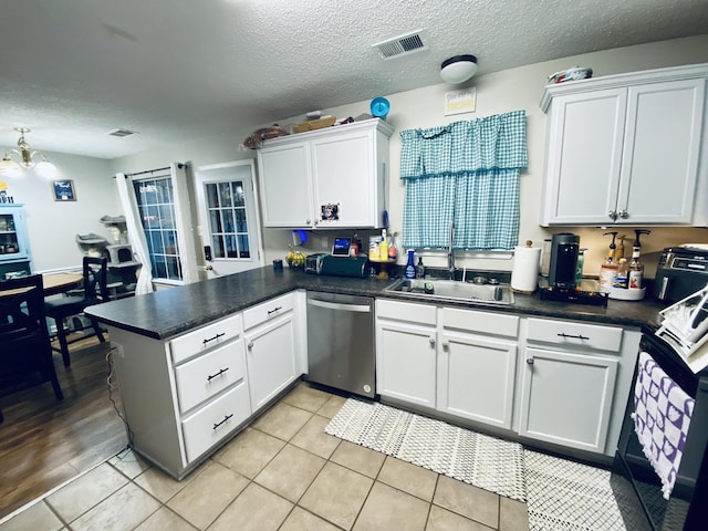 kitchen with dishwasher, light hardwood / wood-style floors, white cabinetry, and sink