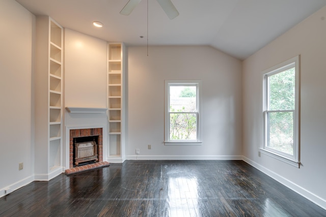 unfurnished living room featuring a fireplace, ceiling fan, dark hardwood / wood-style flooring, and vaulted ceiling