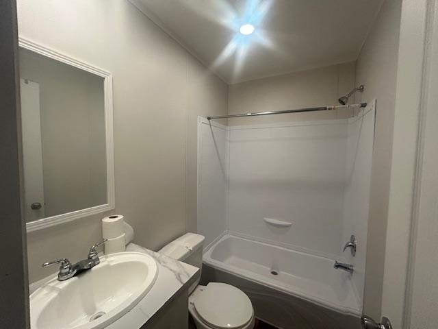 full bathroom with vanity, toilet, and shower / bathtub combination