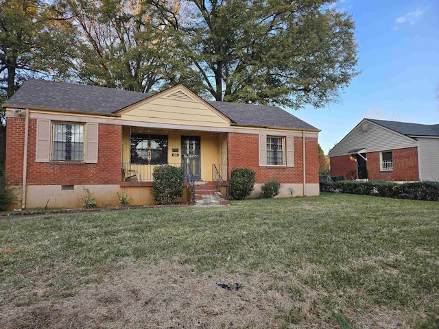 view of front of property with a porch and a front yard