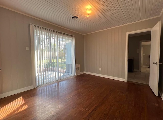 unfurnished room with dark hardwood / wood-style flooring, wood ceiling, and crown molding