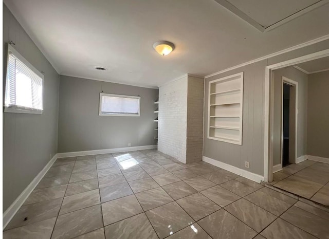 unfurnished bedroom featuring light tile patterned floors and ornamental molding