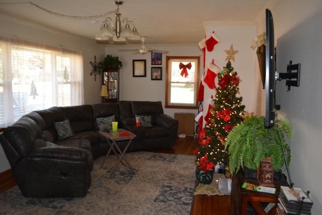 living room with crown molding, ceiling fan, and hardwood / wood-style floors