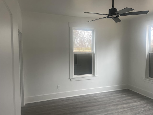 spare room featuring ceiling fan and hardwood / wood-style floors