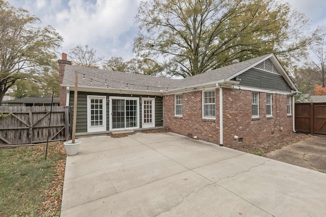 rear view of house featuring a patio