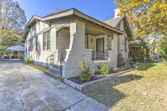 view of home's exterior with covered porch