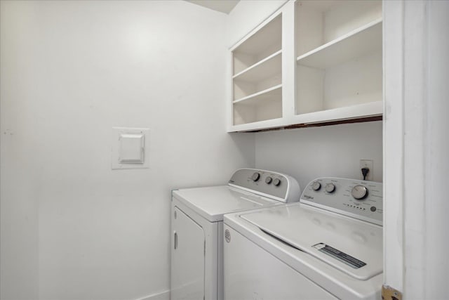 laundry area featuring washing machine and dryer