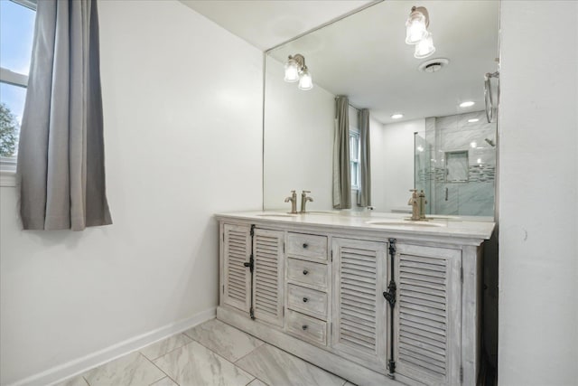 bathroom with vanity and an enclosed shower