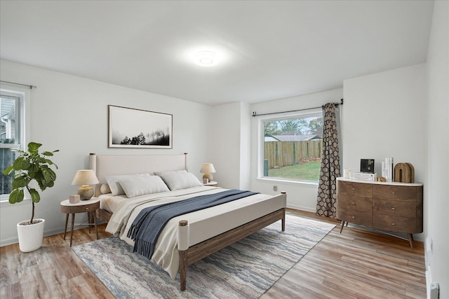 bedroom featuring light hardwood / wood-style floors