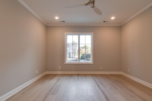 unfurnished room featuring crown molding, light hardwood / wood-style flooring, and ceiling fan