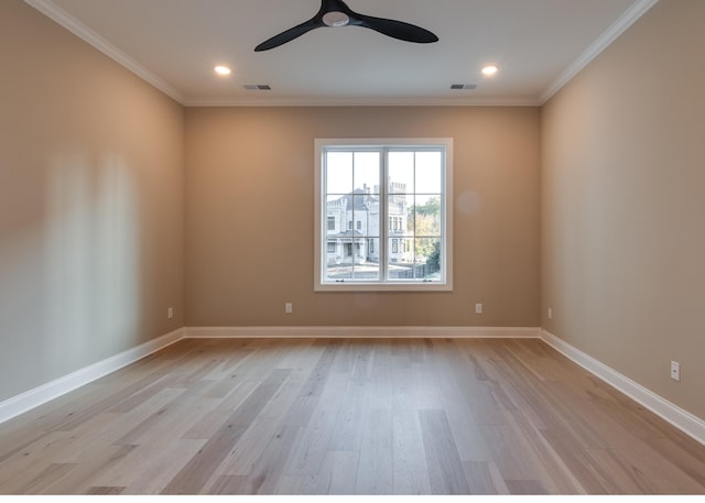 unfurnished room with ceiling fan, light wood-type flooring, and ornamental molding